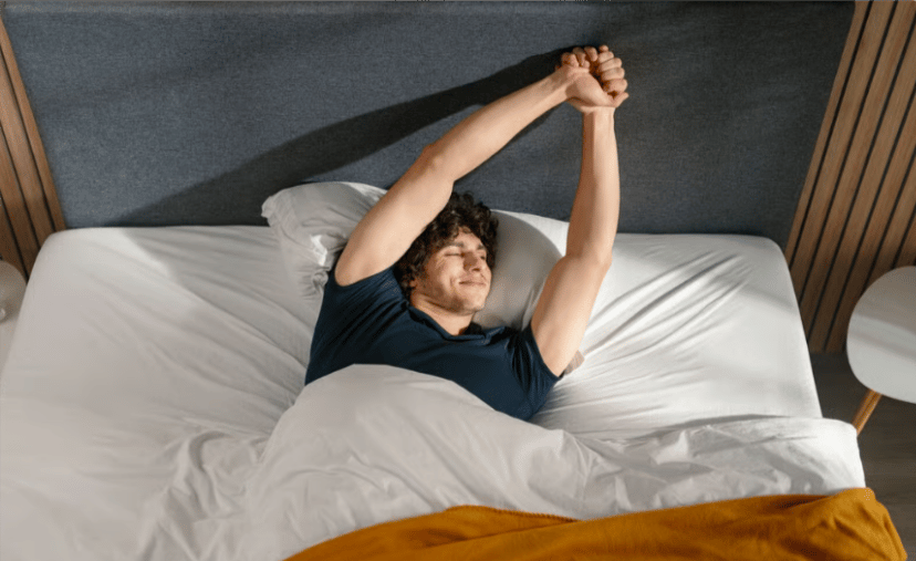 persona que duerme en un colchon emma